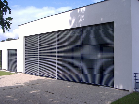 Store de baies vitrées et façades soleil - Menuiserie Guy Rollande - Maître Artisan Spécialiste Rénovation en Loire Atlantique (44)